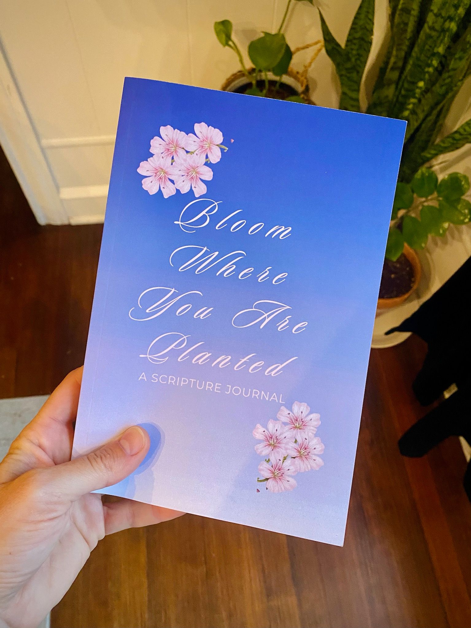 Periwinkle colored cover with flowers for the Bloom journal
