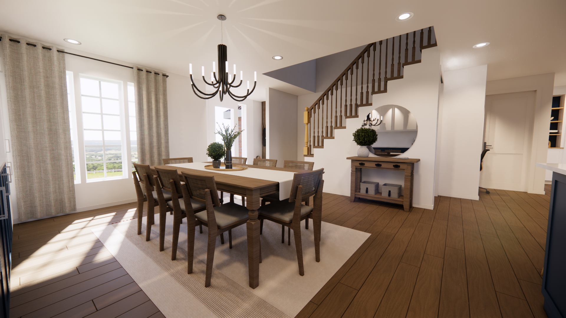 Salle à manger avec une longue table en bois, des chaises, un lustre et un escalier.