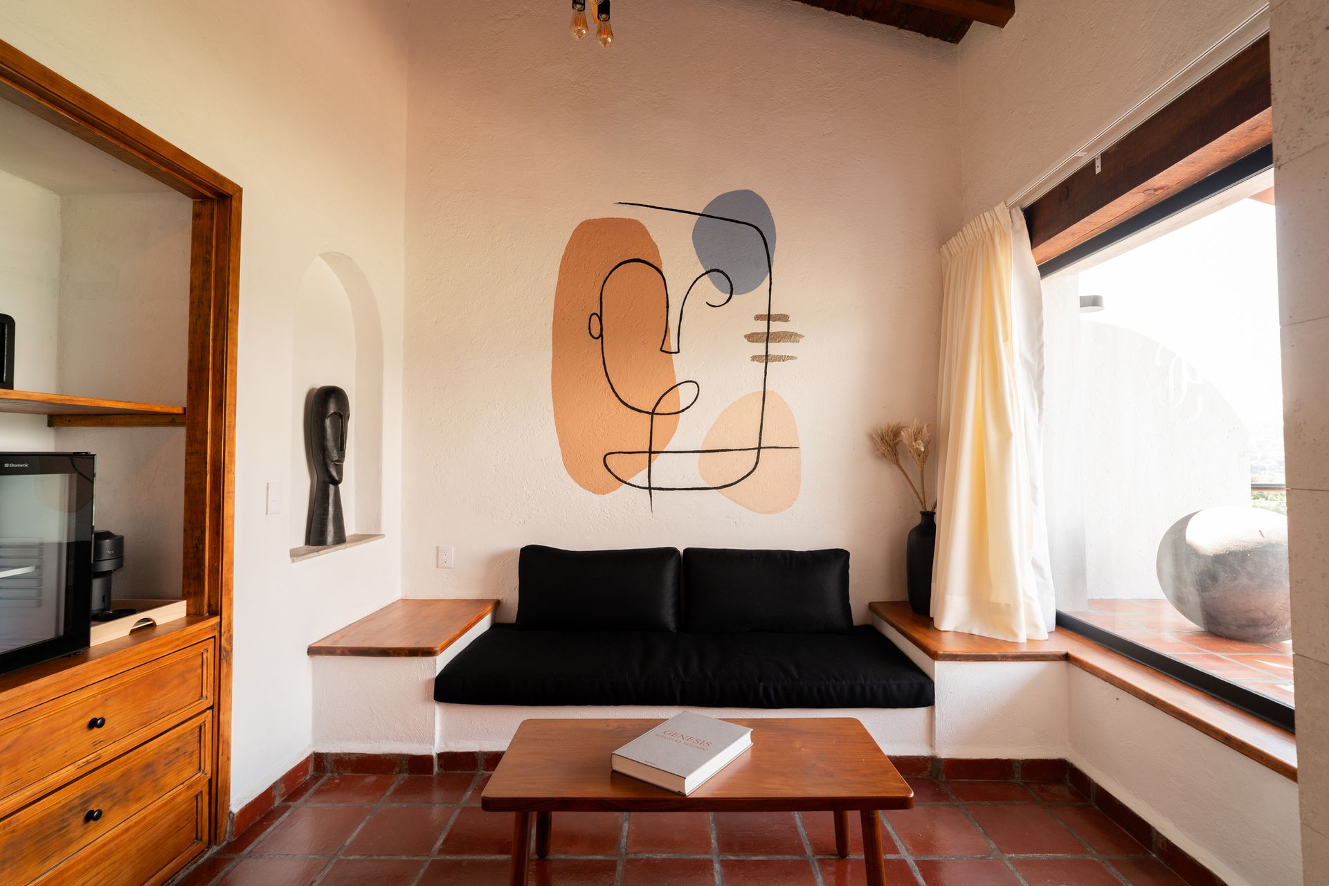 Una sala de estar con un sofá de Hanna Hotel Boutique