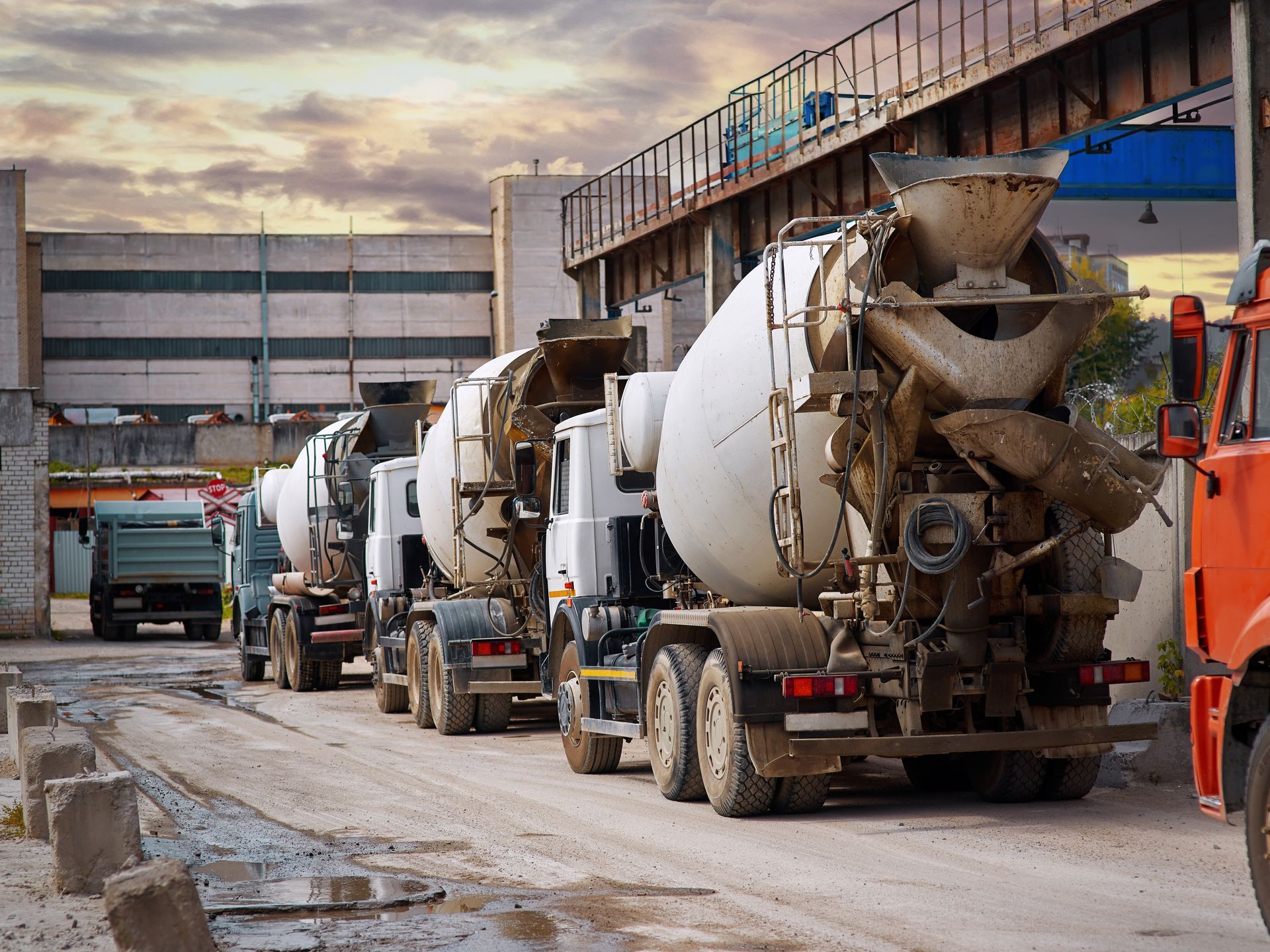 Heavy mixer concrete trucks.