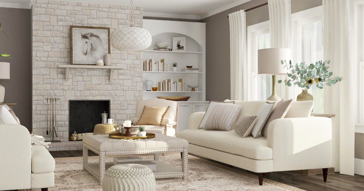 A living room filled with furniture and a fireplace.