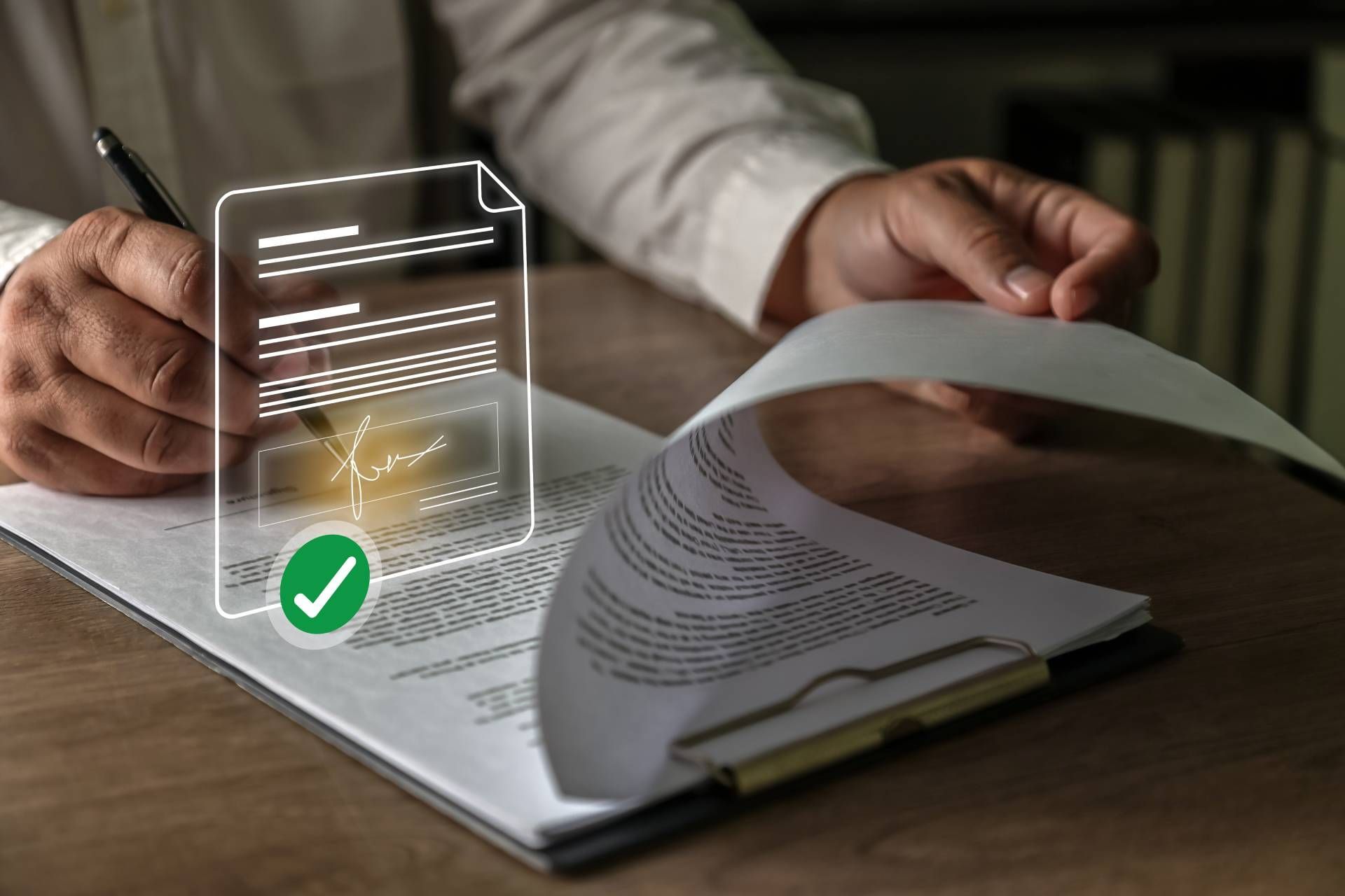Hands scanning a document on a desk with a digital approval checkmark overlay