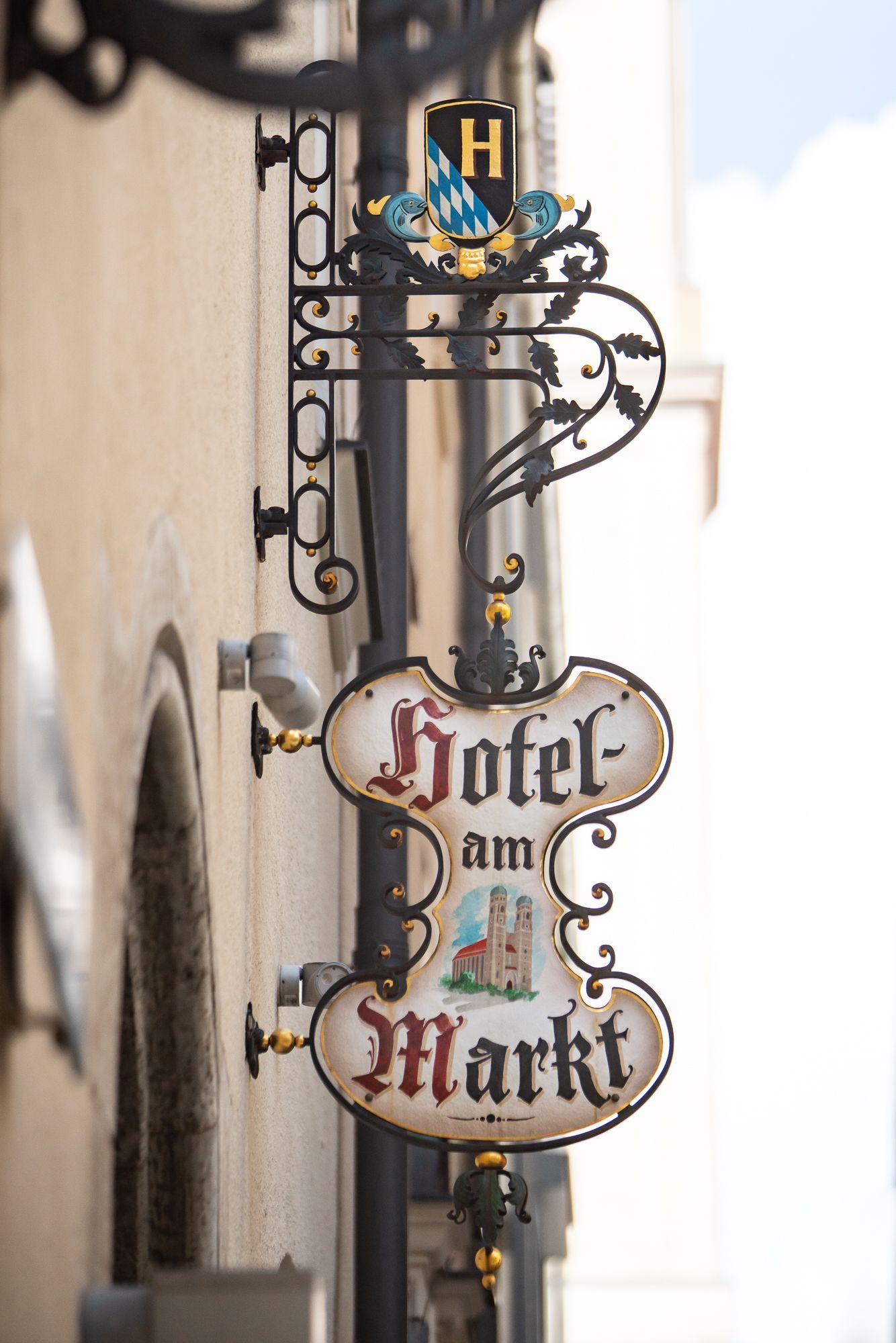 Ornate hotel sign reading