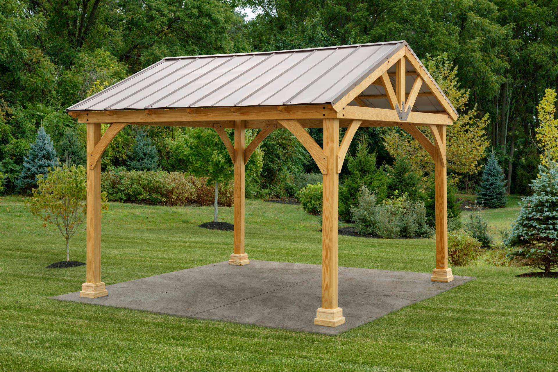A wooden outdoor pavilion with a metal roof, situated on a stone patio in a lush, green yard.