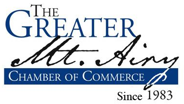 The Greater Mt. Airy Chamber of Commerce logo with “Since 1983” in blue and black text