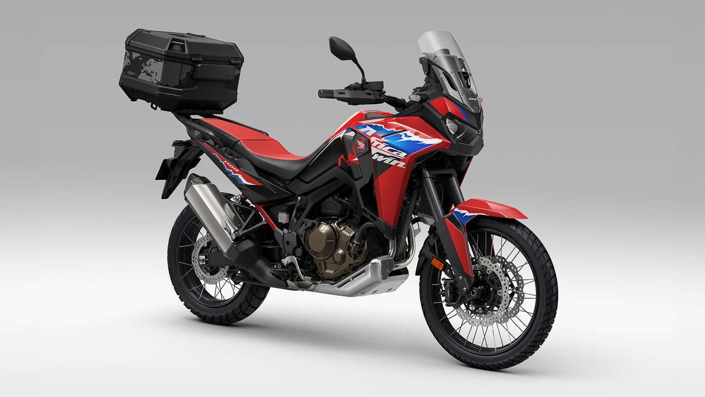 vailable with a 58L plastic Top Box (with room for 2 full-face helmets) which has new redesigned decorative stripes, or a 42L Aluminium Top Box, the Urban pack also features a Carrier Bracket, Backrest and inner Bag. The main stand makes for straightforward rear wheel/chain maintenance, while the Heated grips and 12V Socket provide added comfort ride (fitted as standard to the Africa Twin ES).