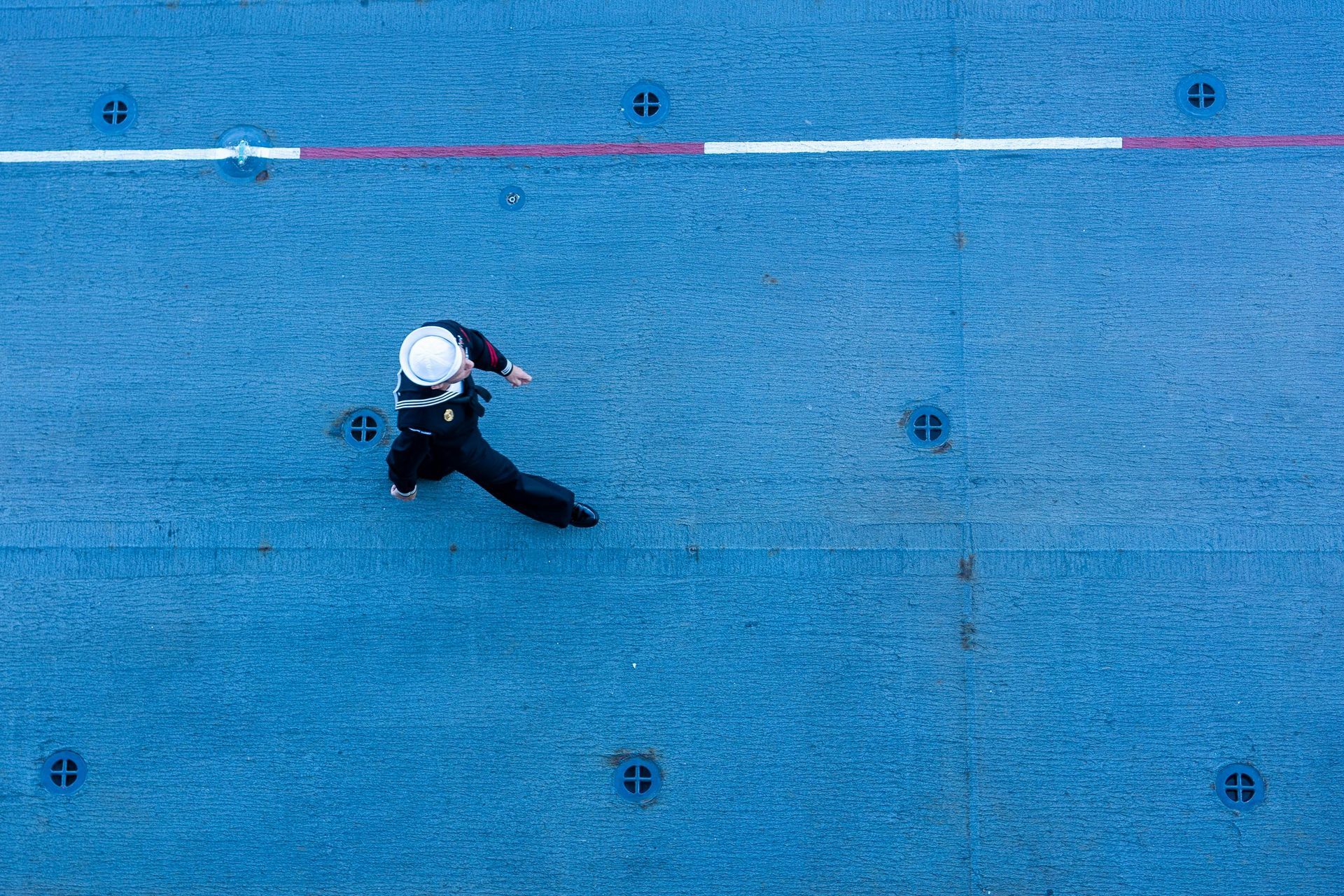 navy waling on ship