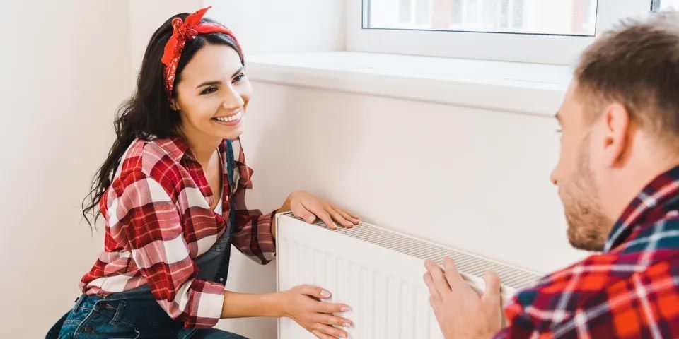 Happy Couple — Vashon, WA — Vashon Heating & Cooling Happy Couple — Vashon, WA — Vashon Heating & Cooling
