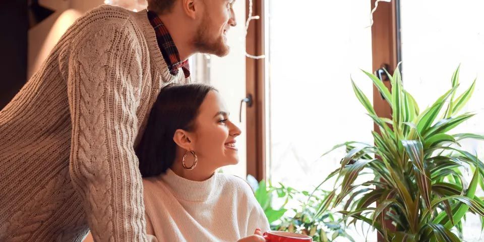 Happy Young Couple — Vashon, WA — Vashon Heating & Cooling Happy Young Couple — Vashon, WA — Vashon Heating & Cooling