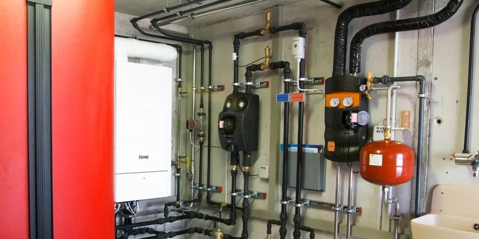 Condensing Boiler Gas in Boiler Room — Vashon, WA — Vashon Heating & Cooling Condensing Boiler Gas in Boiler Room — Vashon, WA — Vashon Heating & Cooling