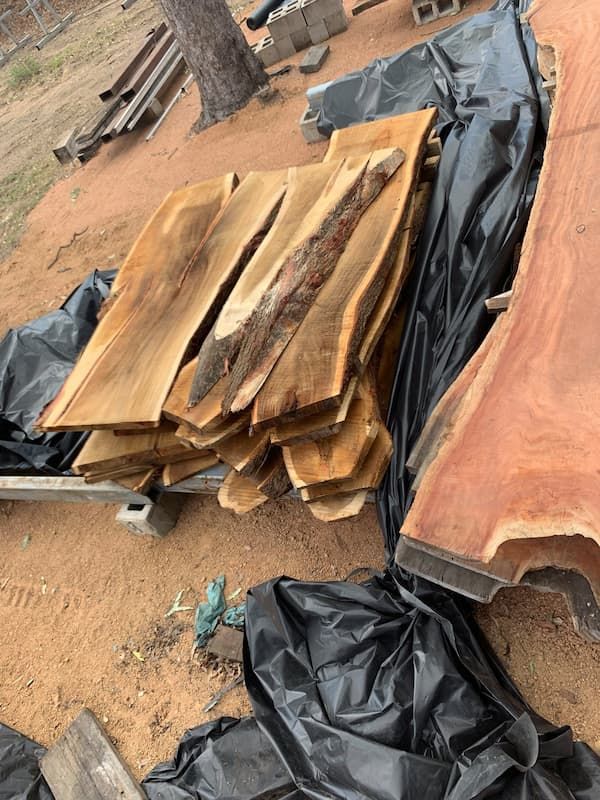Wooden Stacks Creating a Rustic and Natural Display — Tree Change NQ in Townsville, QLD
