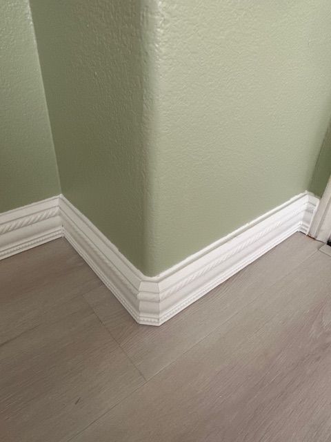 Flooring installations with baseboard updates in San Marcos.