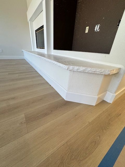 nice details around fireplace for new flooring in carlsbad ca