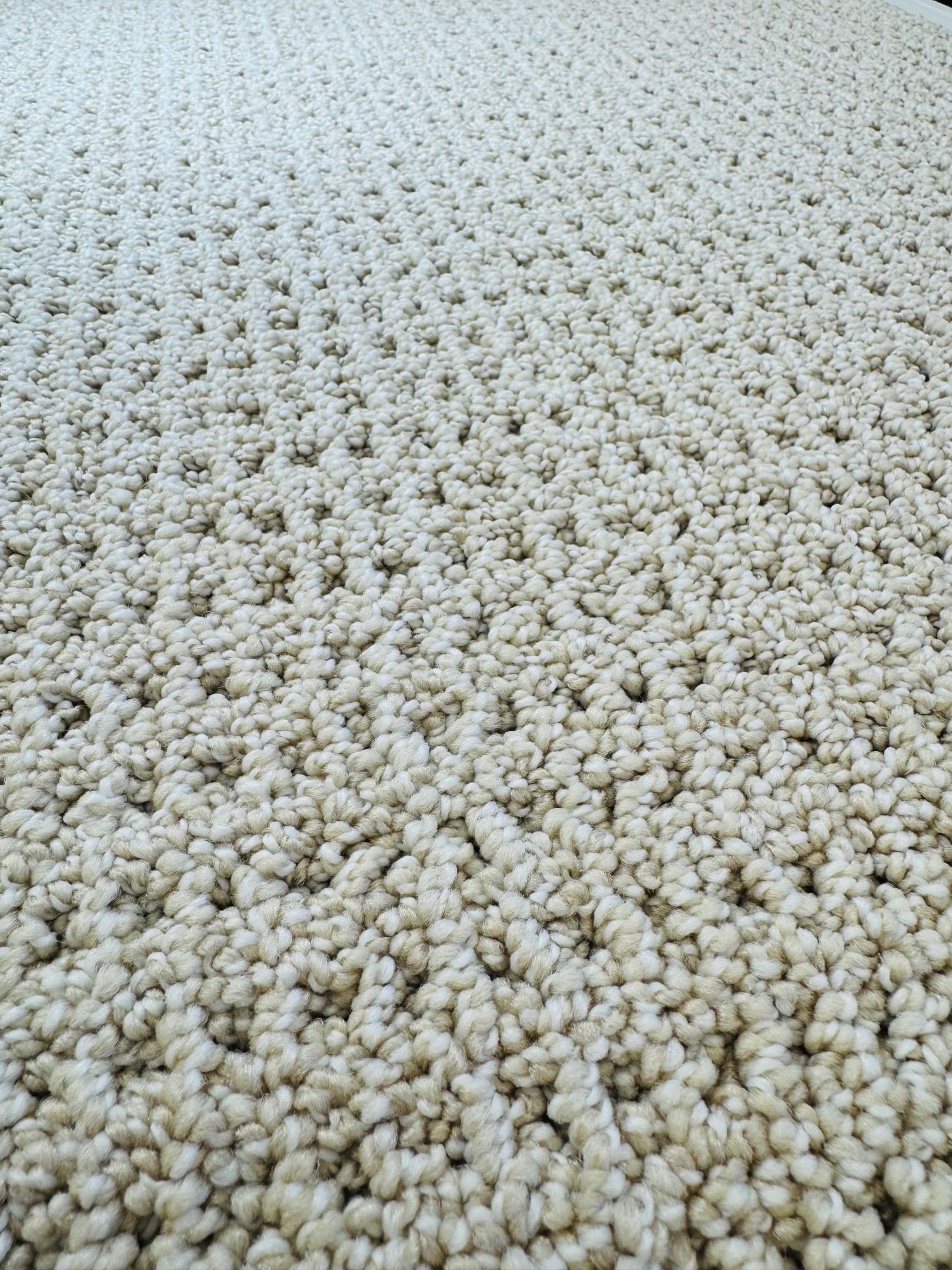 berber style loop carpet with small square patterns