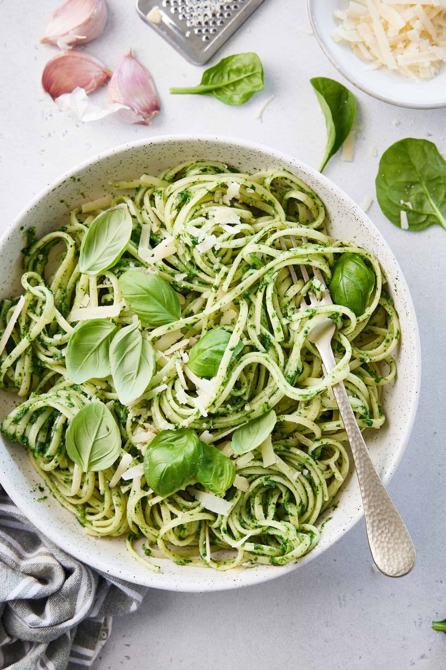 Plated garlic parmesan pasta served in a modern apartment kitchen at The Ovelo Hollywood with a warm, minimal aesthetic and natural light
