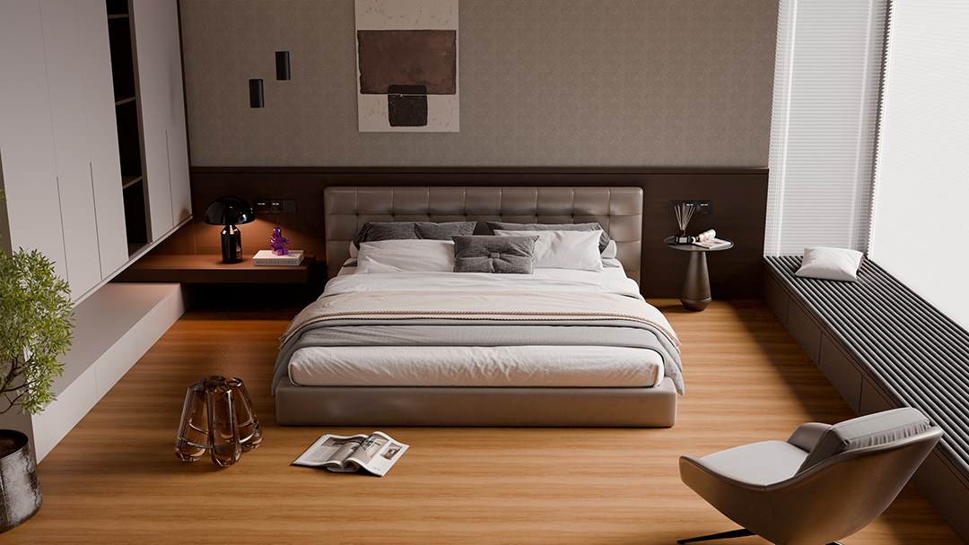 Um quarto moderno com uma grande cama estofada cinza, piso de madeira, um banco lateral e uma poltrona minimalista.