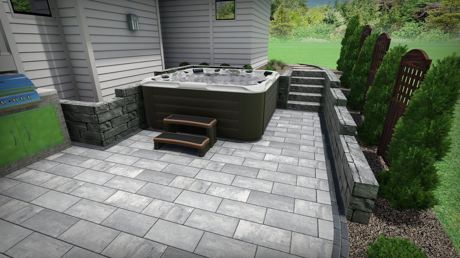 Backyard patio with stone pavers, hot tub, wooden steps, and neatly trimmed shrubs.