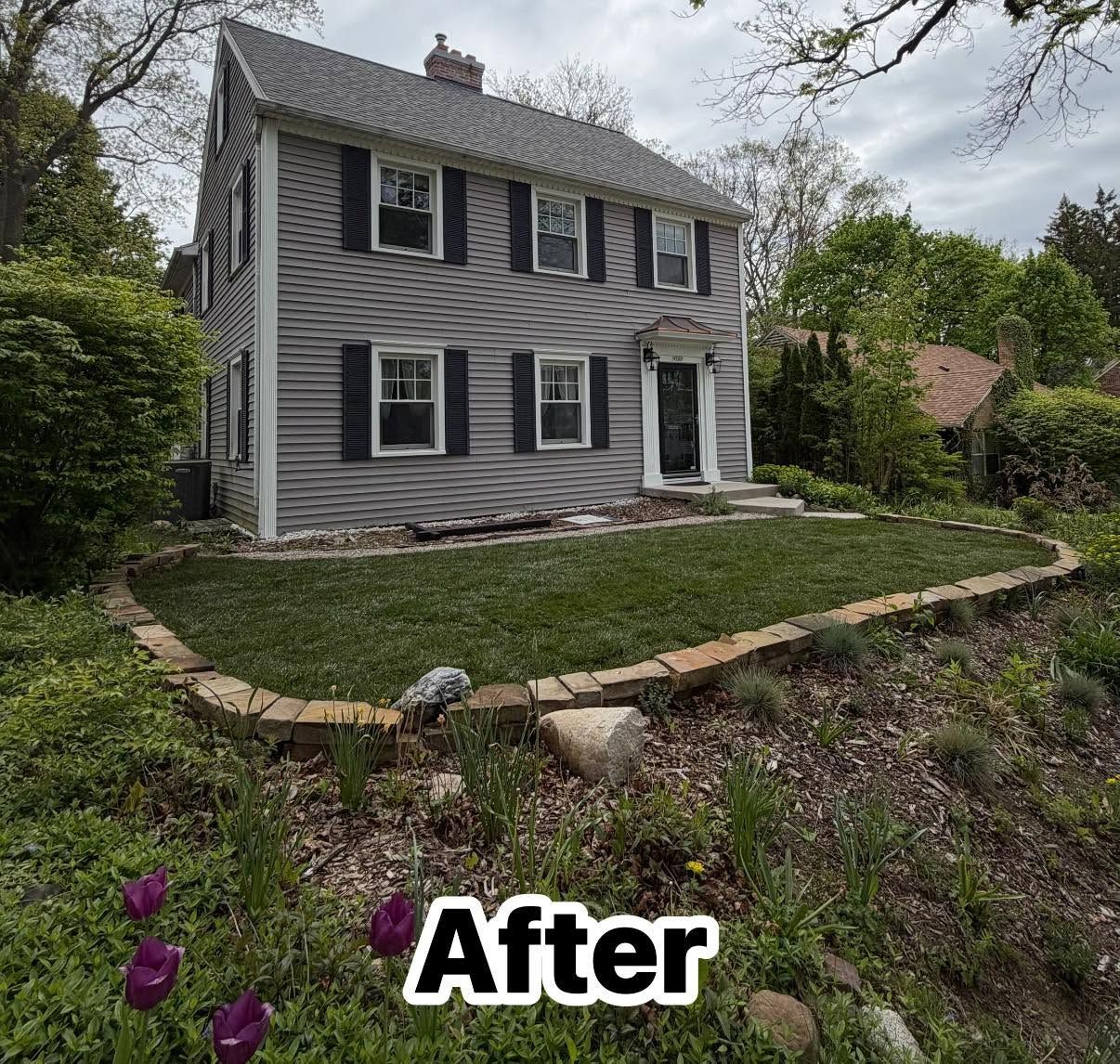 Gray two-story house with black shutters and landscaped front yard, labeled “After”