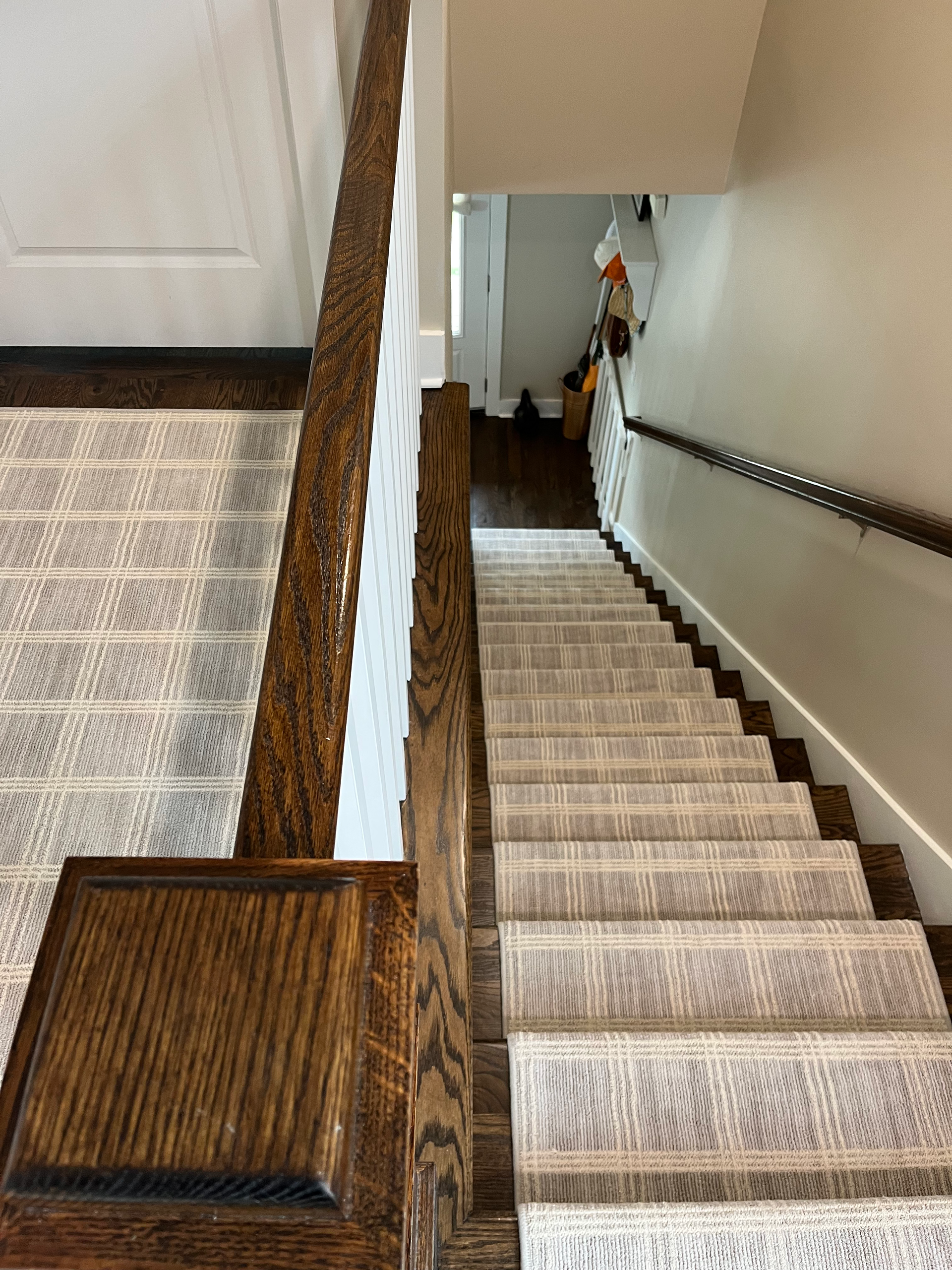 A set of stairs leading up to a second floor in a house.