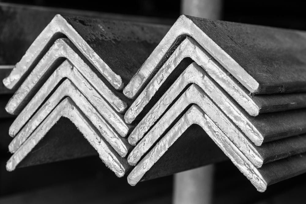 A Black and White Photo of a Stack of Metal Angles — Top End Steel Supplies Darwin In Humpty Doo, NT