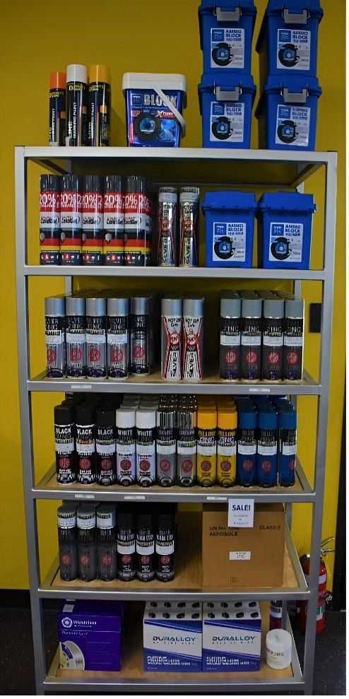 A Shelf Filled With Lots of Different Types of Spray Paint — Top End Steel Supplies Darwin In Tiwi, NT