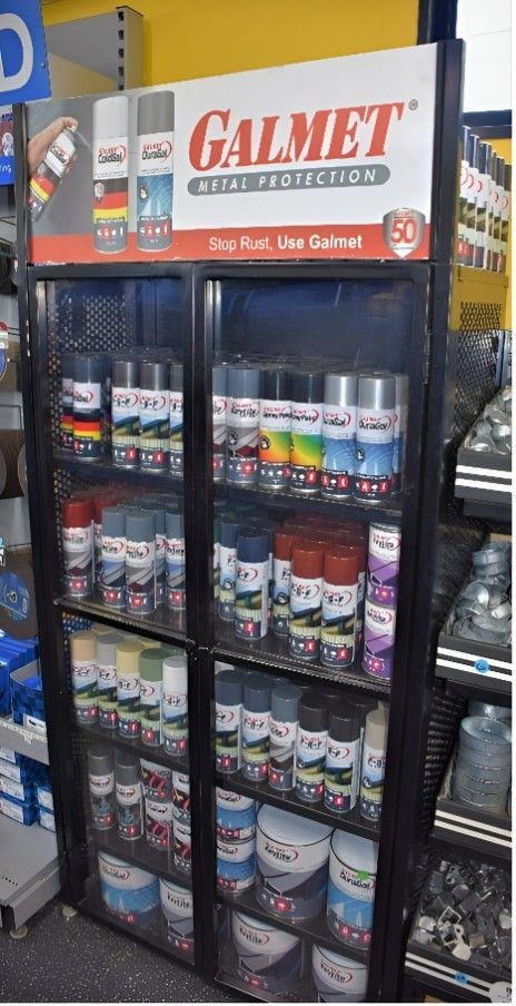 A Display Case Filled With Gallet Spray Paints — Top End Steel Supplies Darwin In Tennant Creek, NT