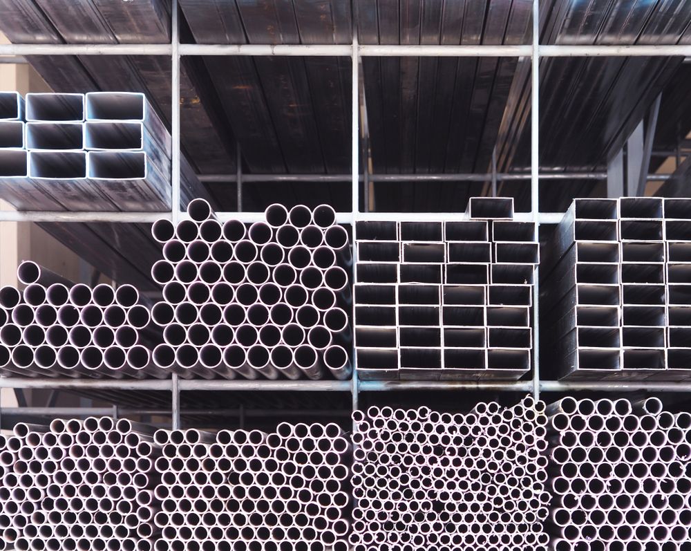 A Warehouse Filled With Lots of Different Types of Metal Pipes — Top End Steel Supplies Darwin In Jabiru, NT