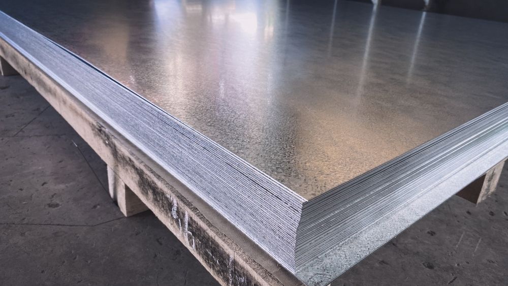 A Large Piece of Metal is Sitting on Top of a Wooden Pallet — Top End Steel Supplies Darwin In Pinelands, NT