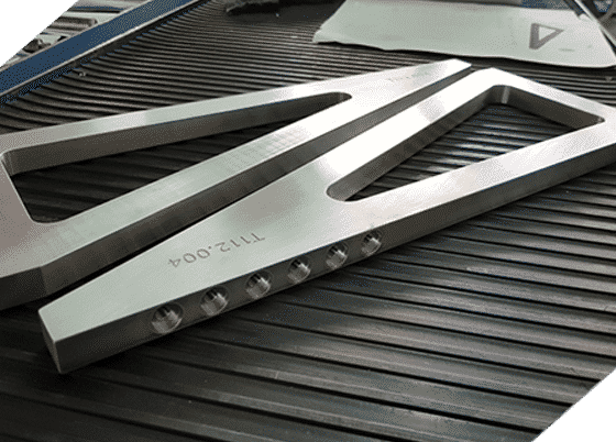 A Pair of Metal Triangles Sitting on Top of a Rubber Mat — Top End Steel Supplies Darwin In Pinelands, NT