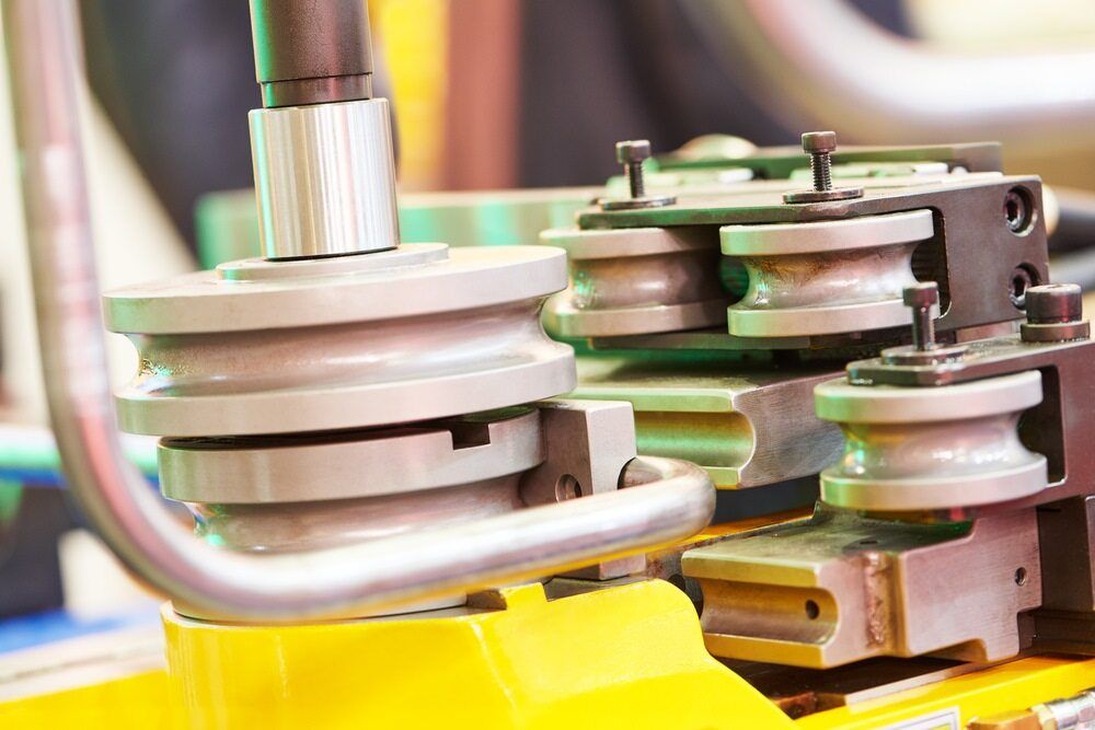 A Close Up of a Metal Pipe Bending Machine in a Factory — Top End Steel Supplies Darwin In Pinelands, NT