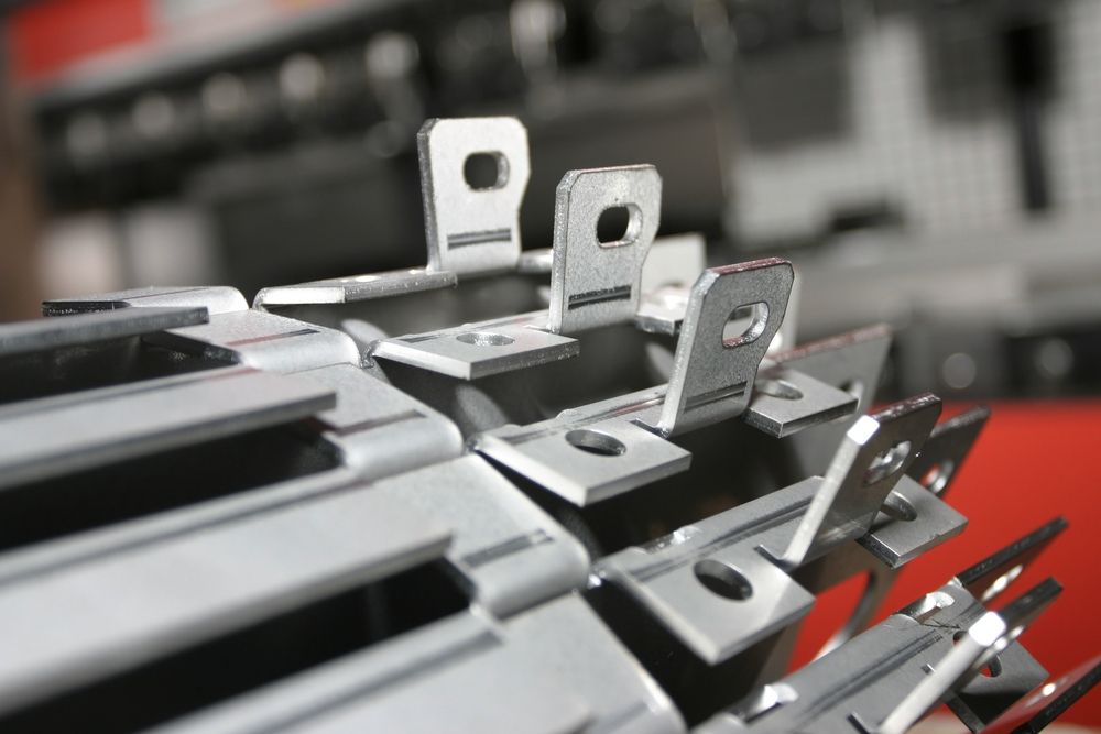 A Bunch of Metal Pieces Are Stacked on Top of Each Other — Top End Steel Supplies Darwin In Humpty Doo, NT