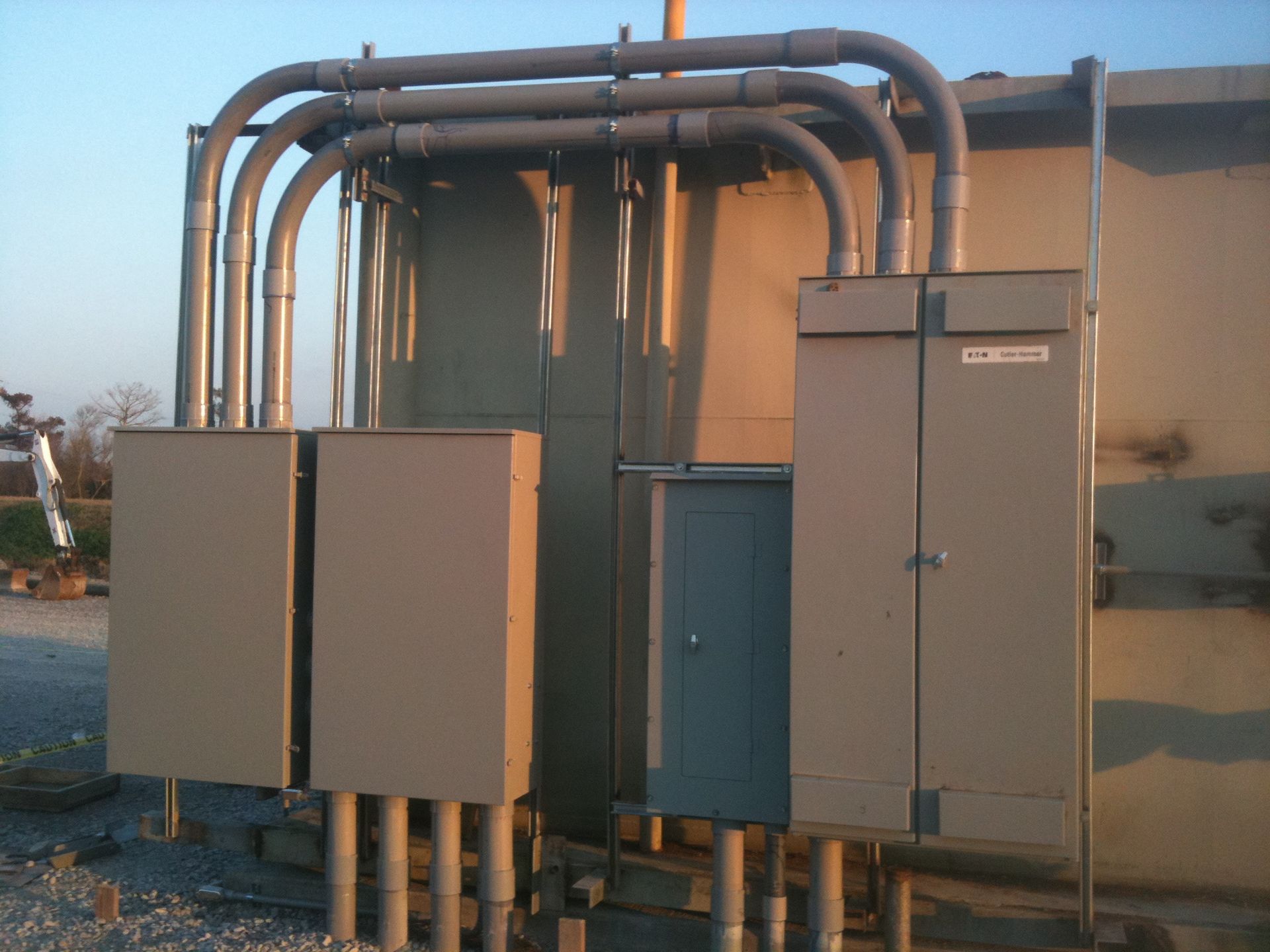 A building with a lot of electrical boxes on it