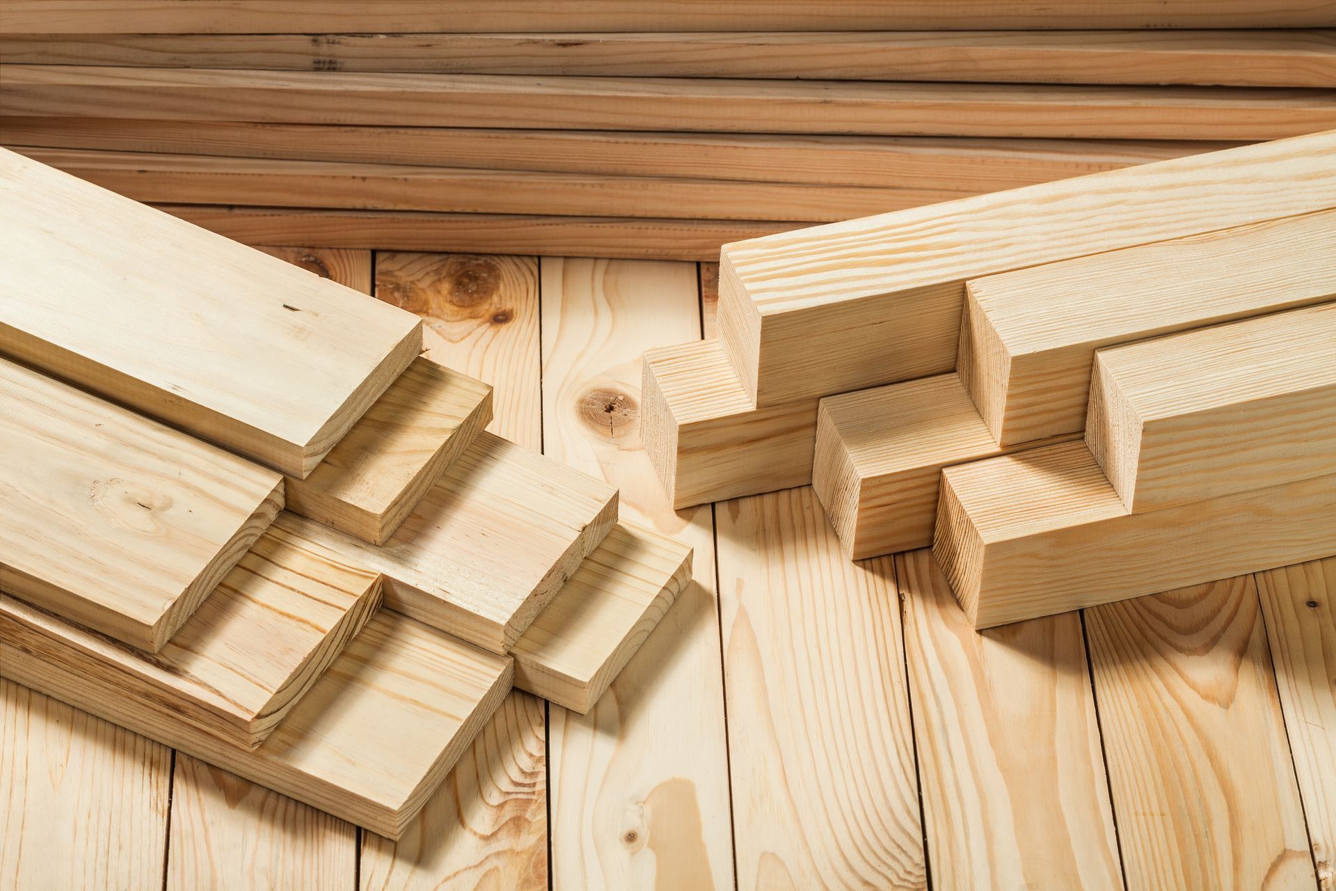 Close-up view of assorted timber supplies on a wooden surface.