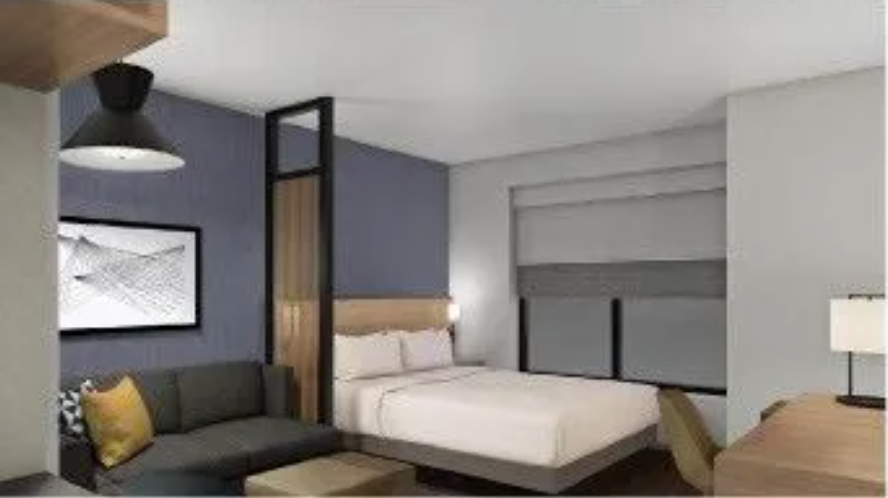 An artist 's impression of a hotel room with a king size bed and a couch.