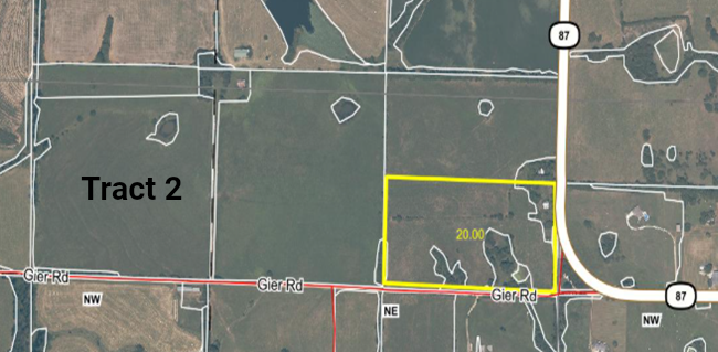 Aerial view of farmland. Tract 2 is labeled. A 20.50-acre section is outlined in yellow. Roads are visible.