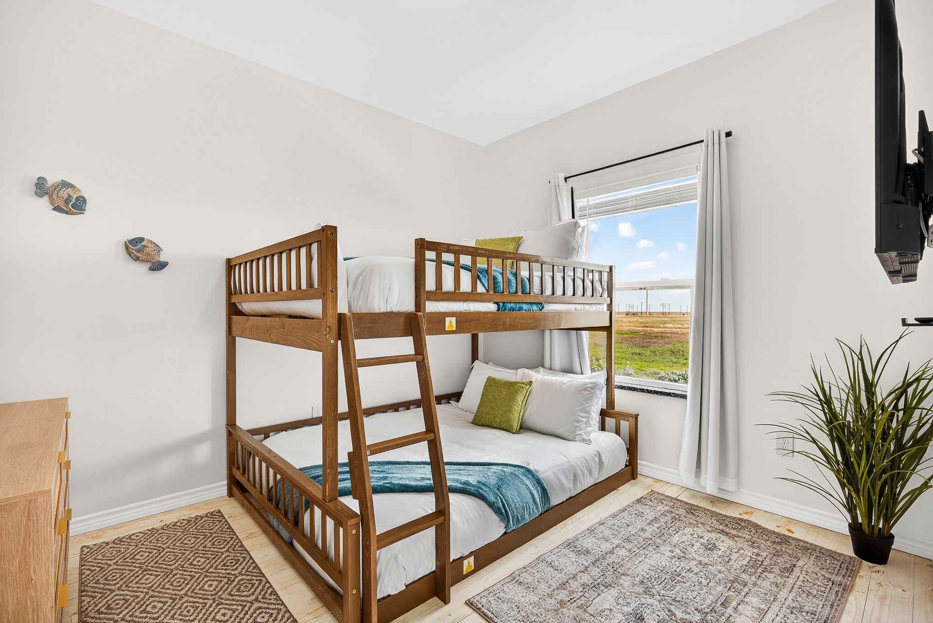 Guest bedroom with a full-over-queen bunk bed