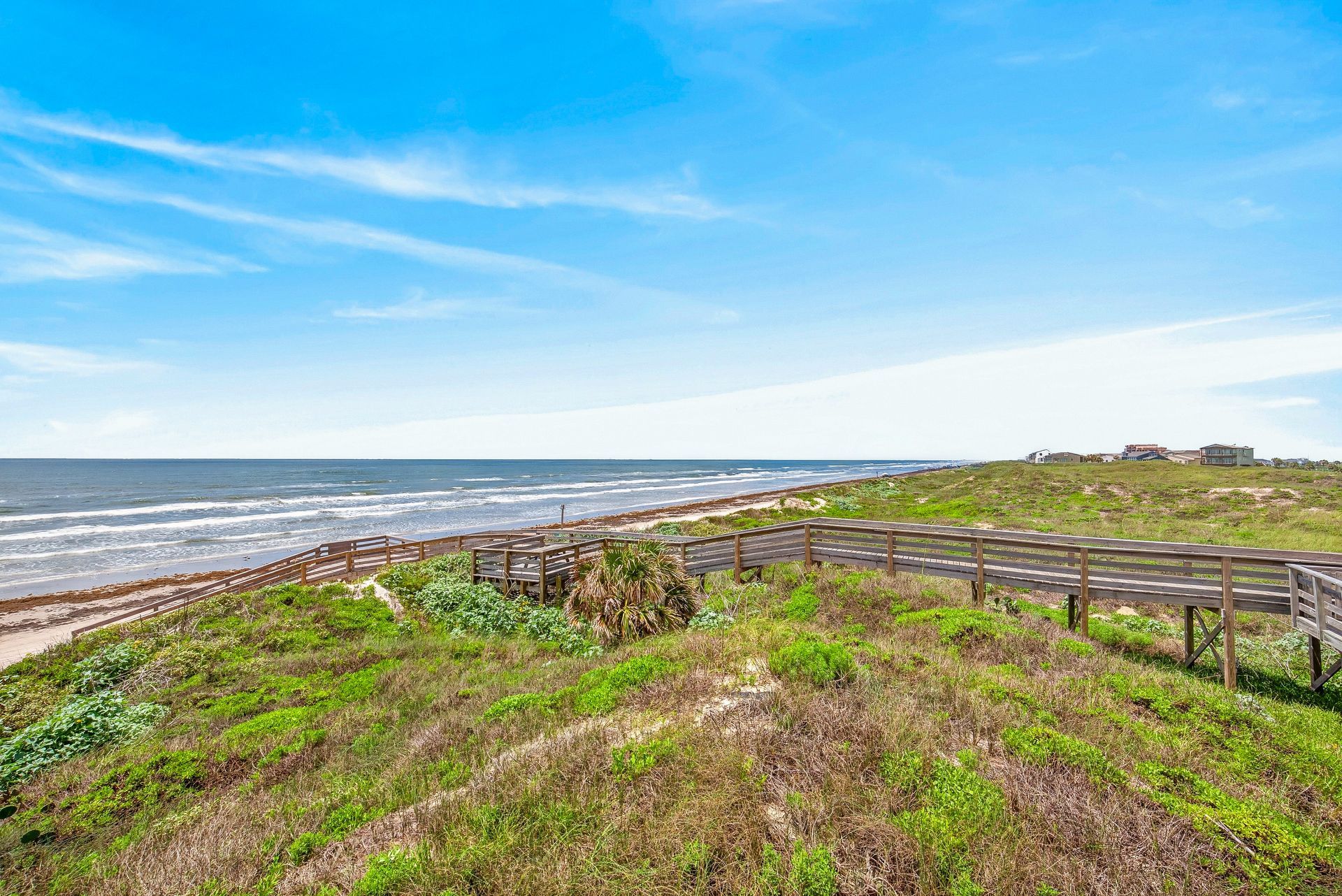 Private boardwalk and coastal dunes beside the Mustang Island shoreline