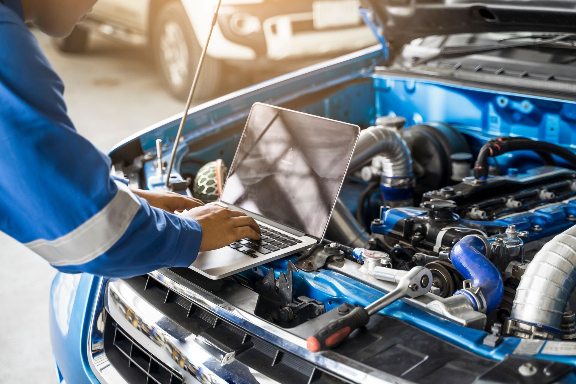 Laptop based engine diagnostics performed on a vehicle during repair service. Laptop based engine diagnostics performed on a vehicle during repair service.