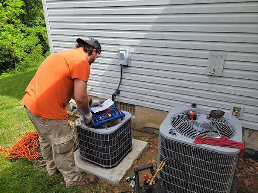 Aaron’s Services technician completing an AC Installation Independence MO homeowners trust