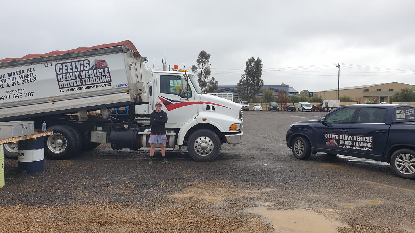 White Freight Truck On Road — Ceely's Heavy Vehicle Driver Training & Assessments In Wagga Wagga, NSW 