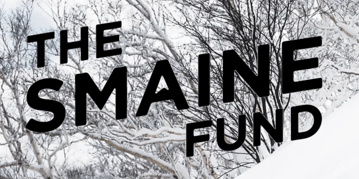 The Smaine Fund text over snowy tree branches