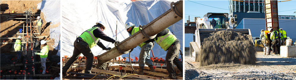 A group of construction workers are working on a large pipe.