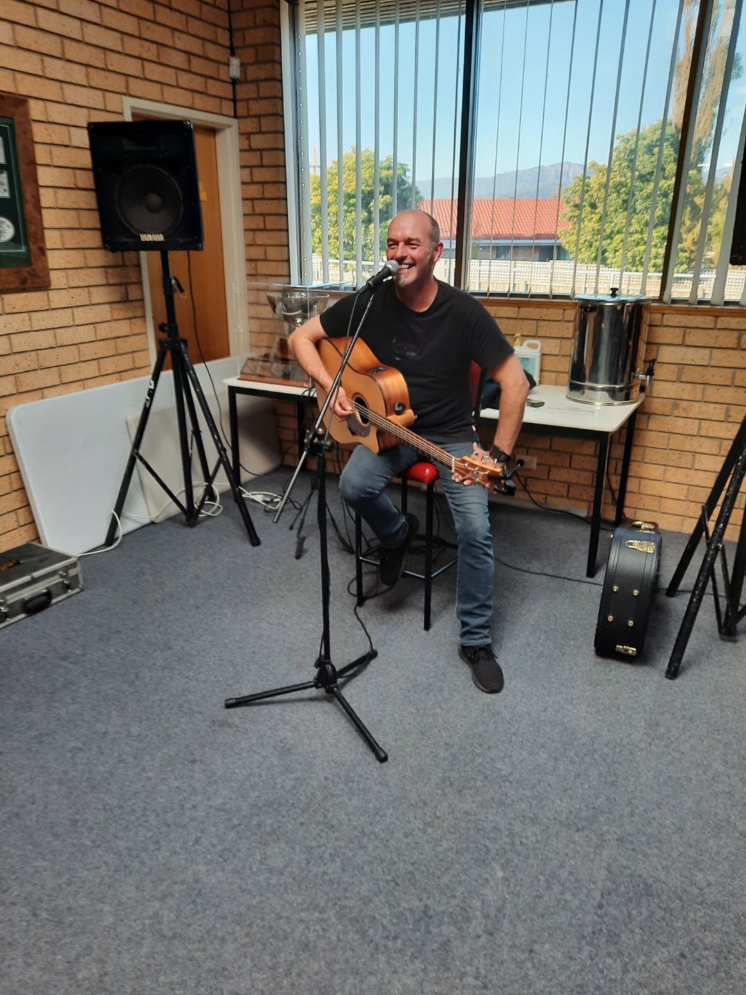 Man Holding Guitar - Claremont, TAS - Claremont RSL