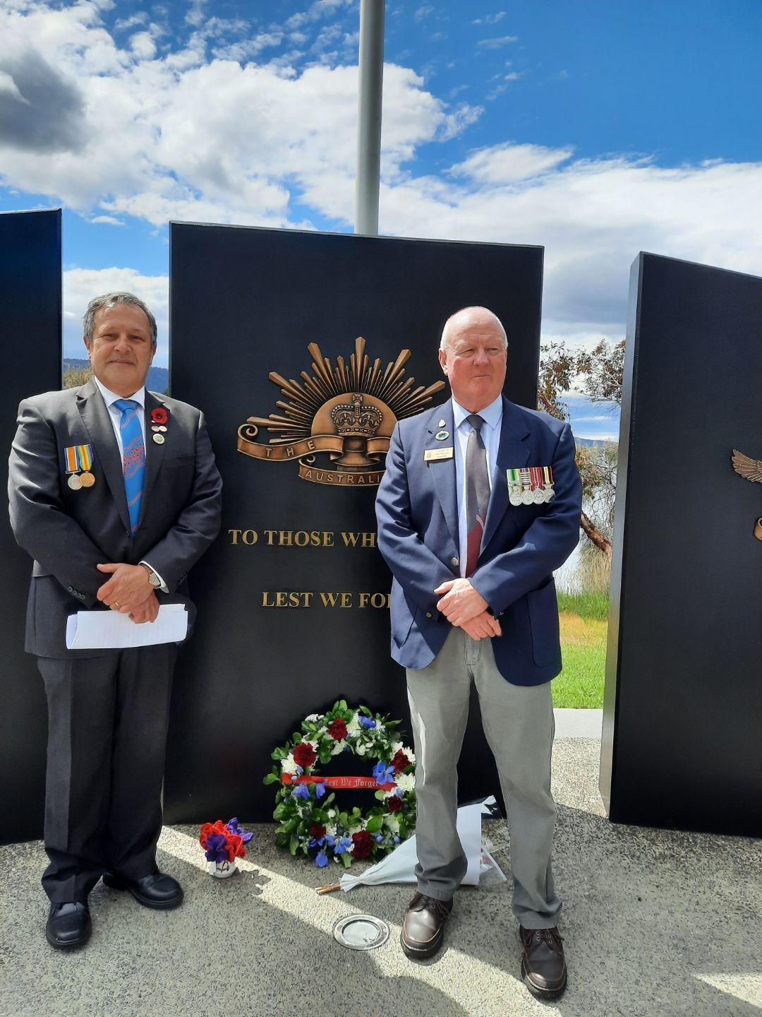 Men Standing On A Sign - Claremont, TAS - Claremont RSL