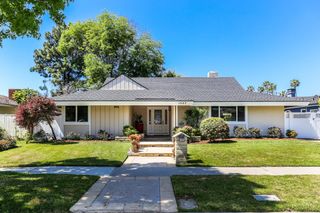 Exterior of home with large grass front yar