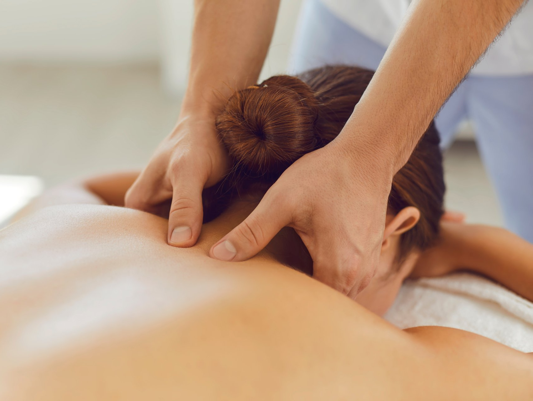massaging in the nape area