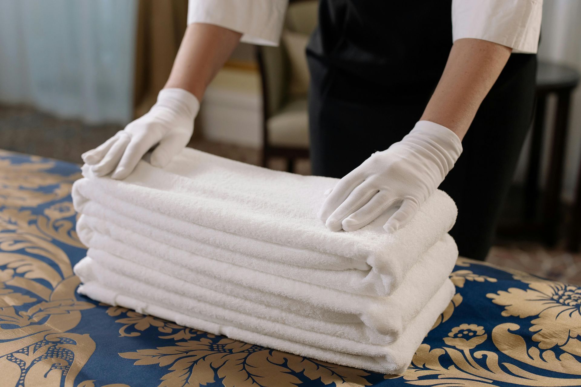Bathroom storage organization with rolled towels for clean visuals