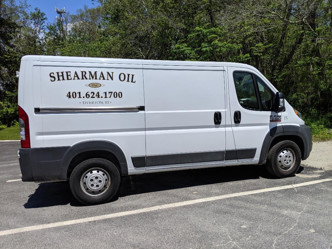 Machine Repairs | Tiverton, RI | Shearman Oil Inc. A heating system repair truck on site of a project in Newport, RI