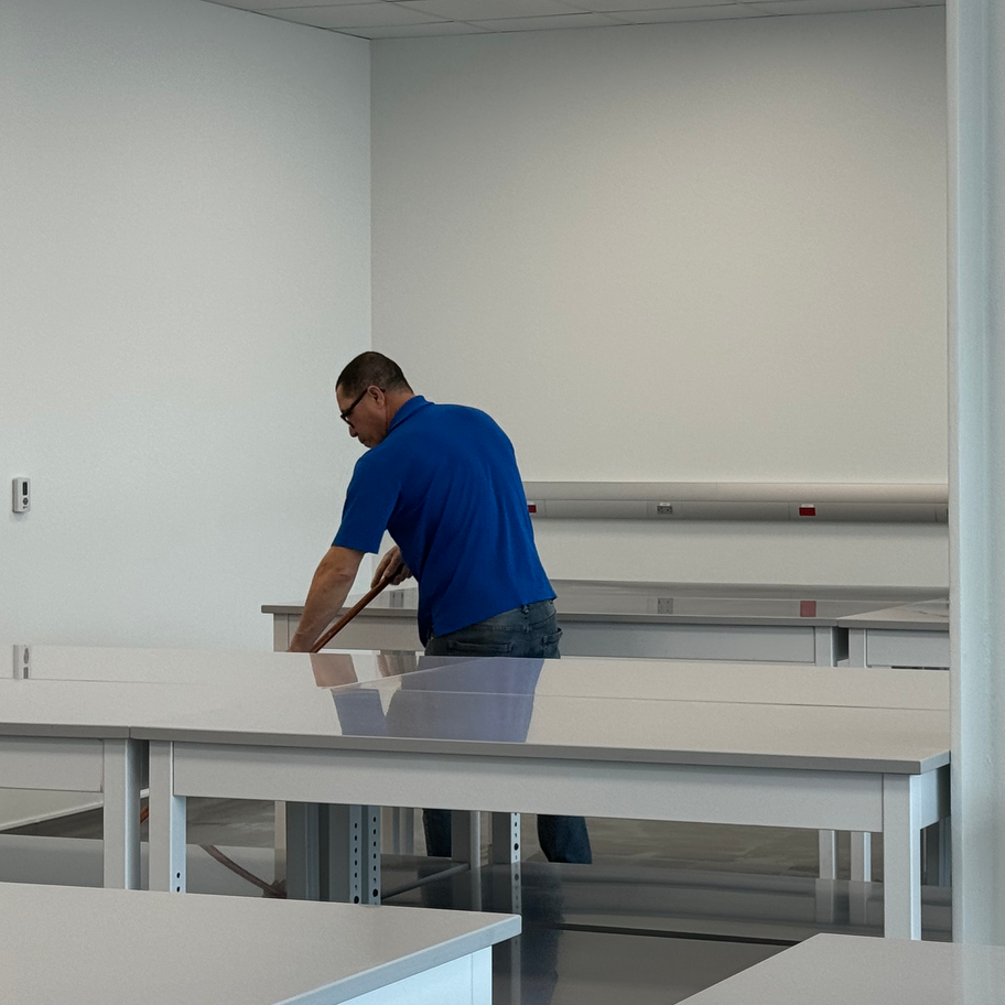 Janitor cleaning a office floor in Cambridge ma.