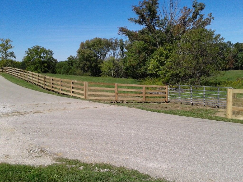Dirt Road With A Wooden Fence Running Alongside It - Columbus, IN - Indiana Agricultural Fencing